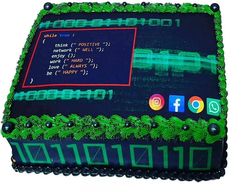 Green laptop cake with code on the screen