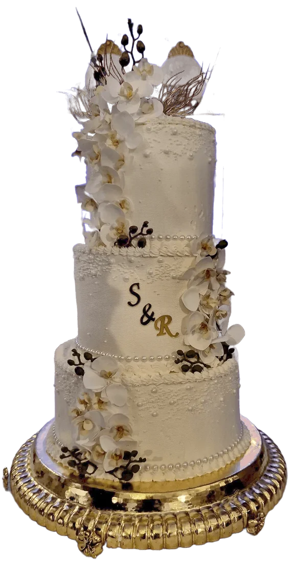 Three-level ivory wedding cake with white orchids and gold initials